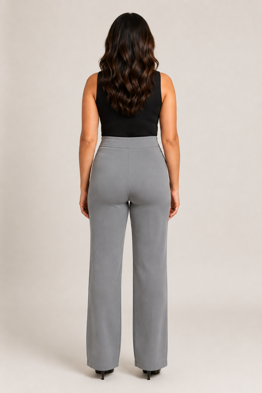 Back view of the grey high-waisted straight-leg trousers showing the clean waistband and straight legs