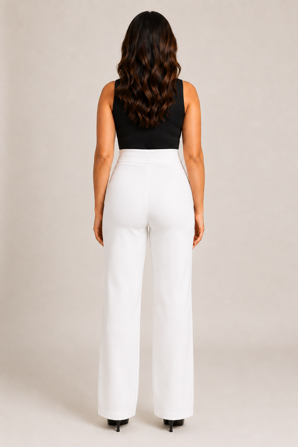 Back view of the white high-waisted straight-leg trousers showing the clean waistband and straight legs