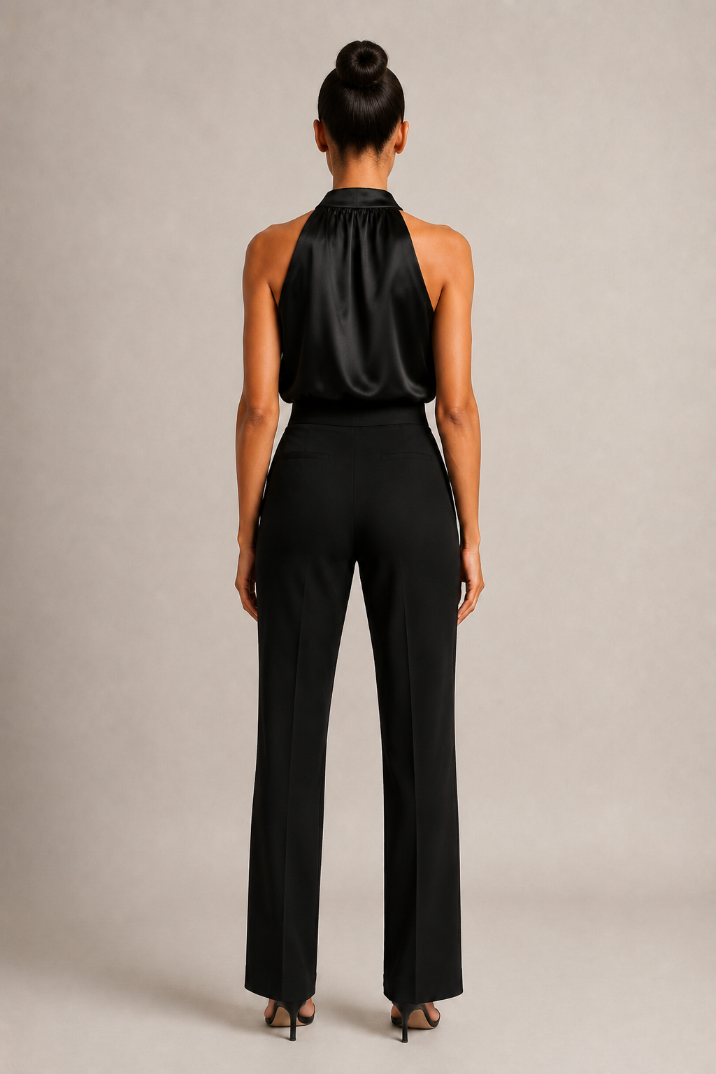 Back view of the black draped halter-neck blouse