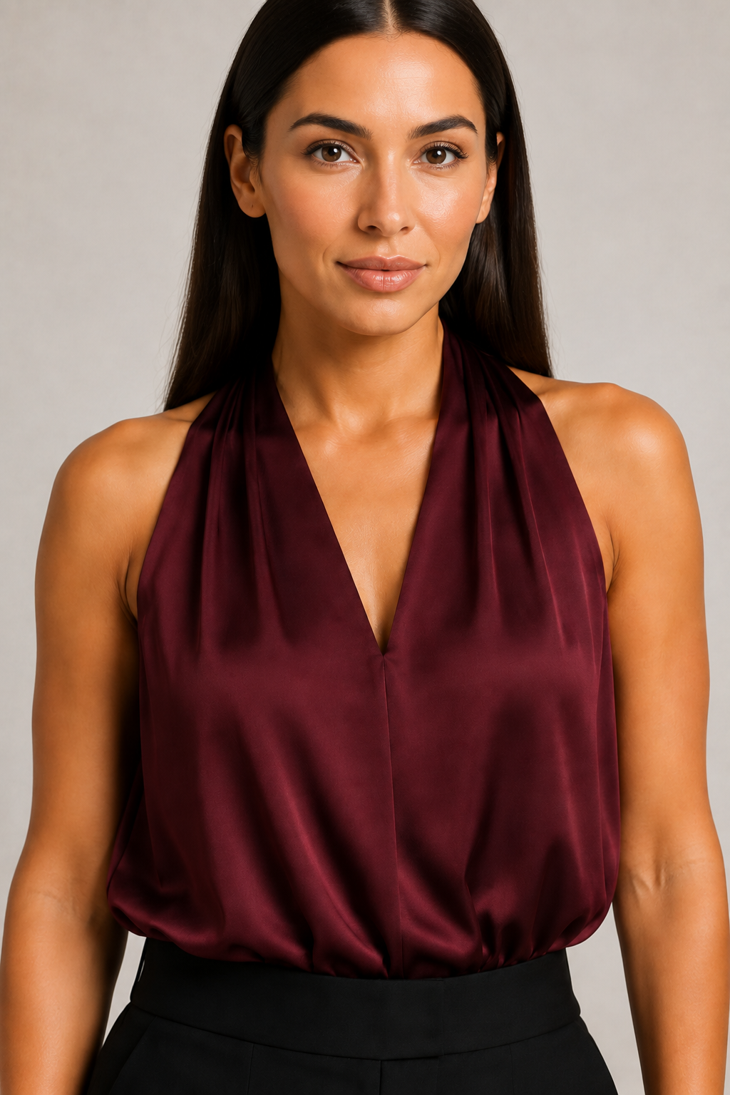 Model-worn close-up of the burgundy blouse showing the smooth lustrous fabric and soft drape