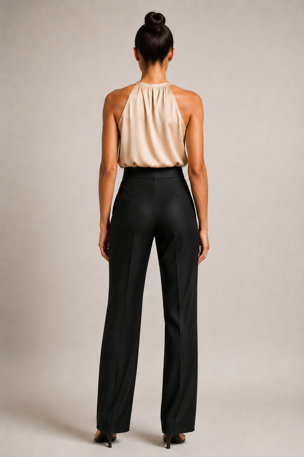 Back view of the champagne draped halter-neck blouse