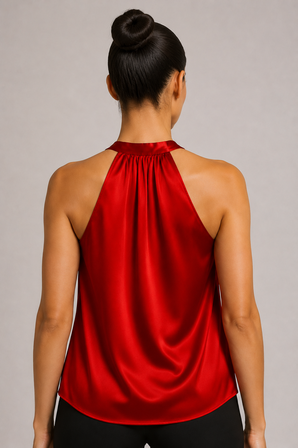 Back close-up of the red blouse showing the broad halter neckline and draped back
