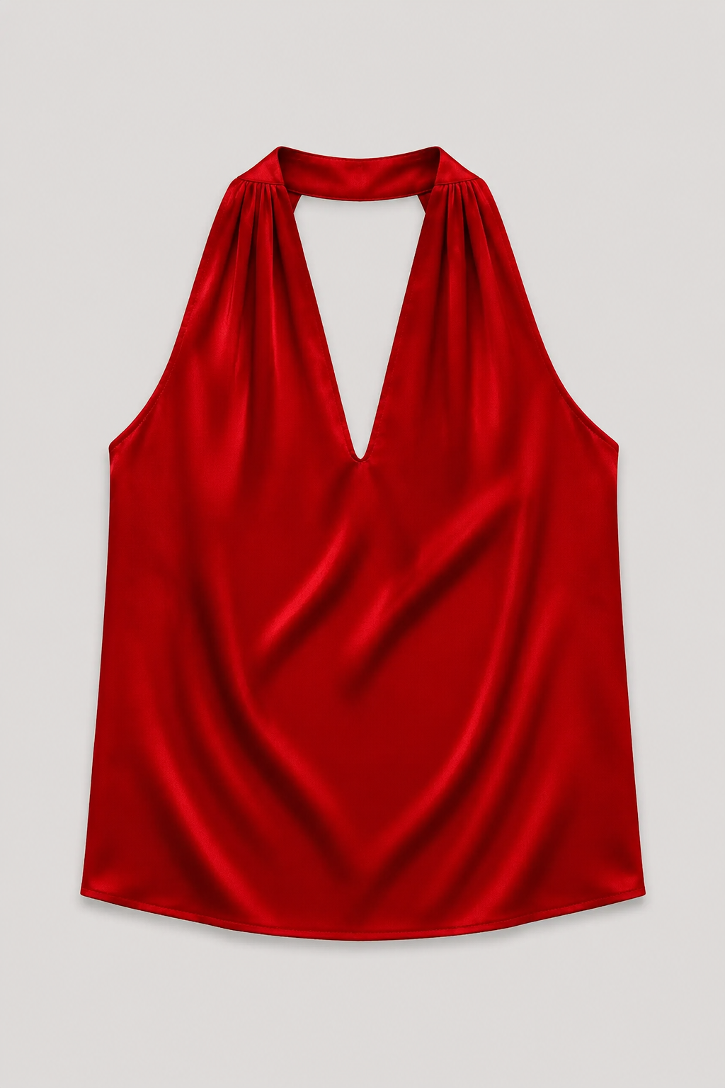 Flat-lay of the red draped halter-neck blouse