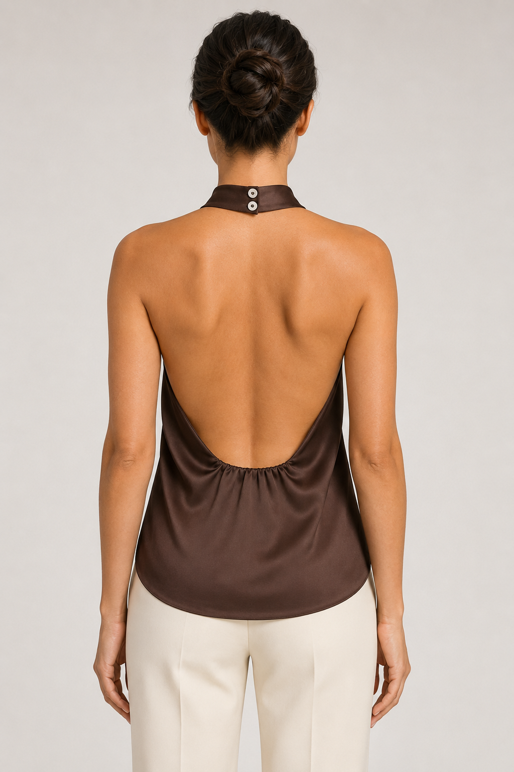 Back view of the brown draped open-back halter top