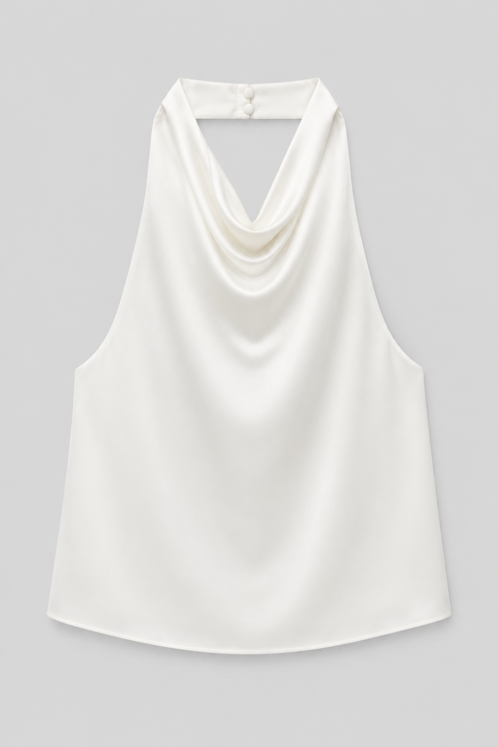Flat-lay of the white draped open-back halter top