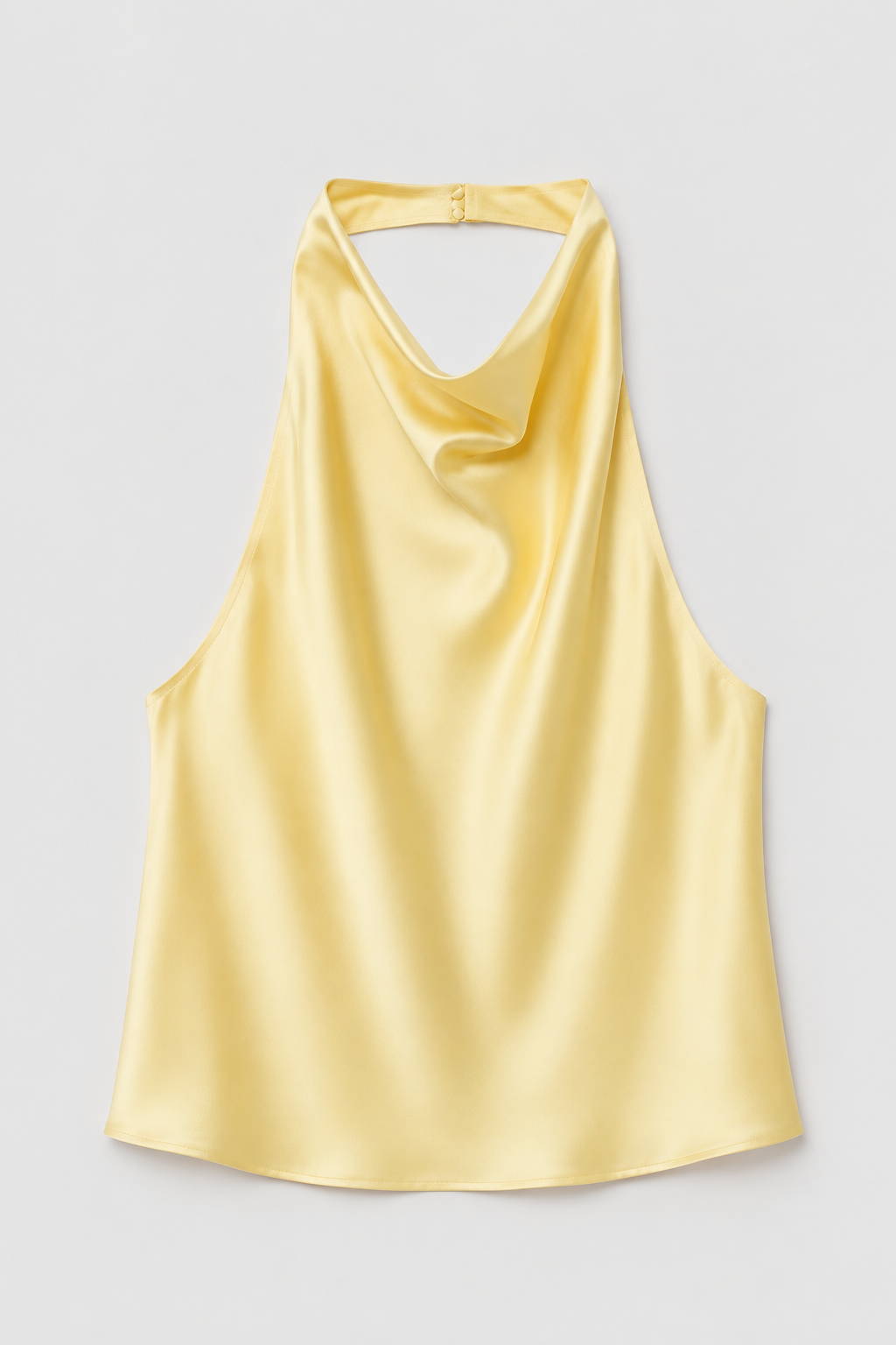 Flat-lay of the yellow draped open-back halter top