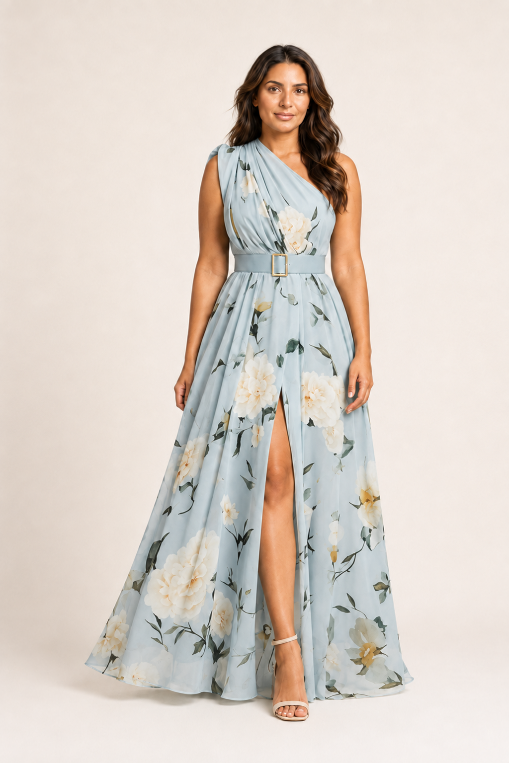 Woman wearing the light blue floral one-shoulder maxi dress, front three-quarter view