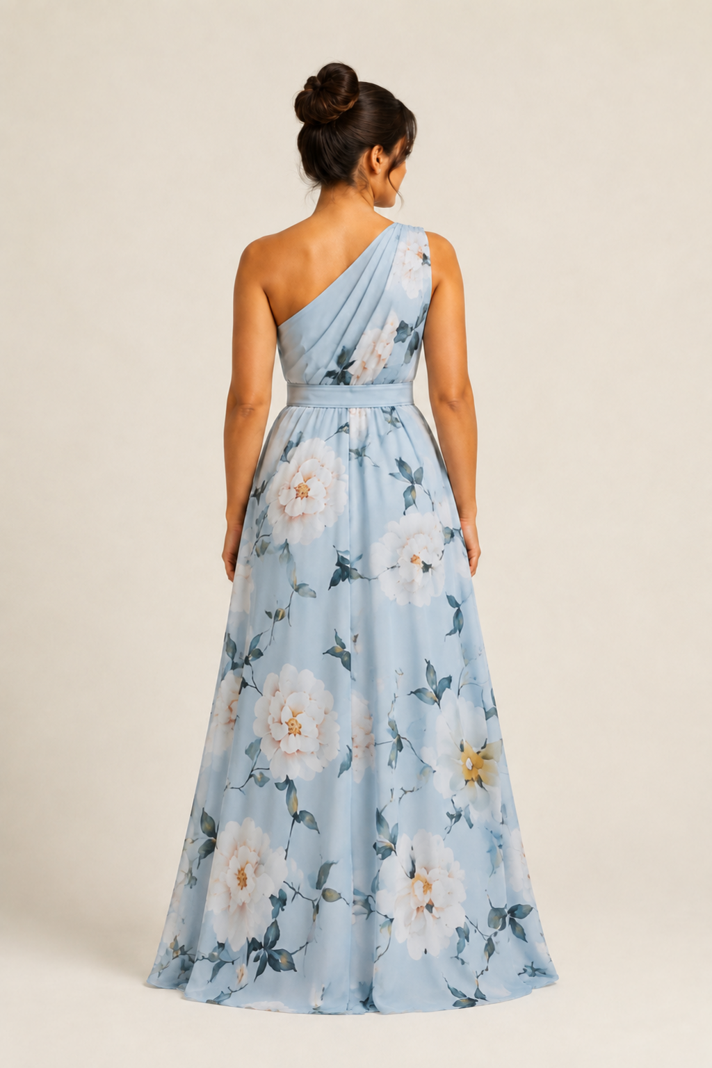 Back view of the light blue floral one-shoulder maxi dress showing the asymmetric neckline and full skirt
