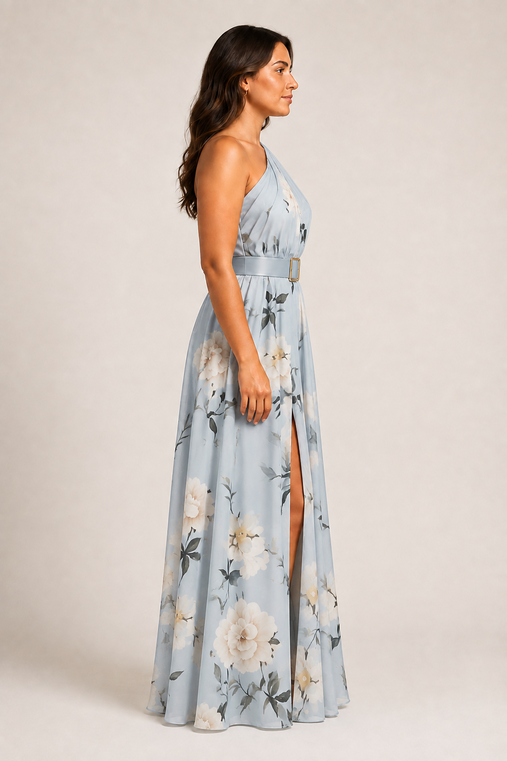Side view of the light blue floral one-shoulder maxi dress showing the belted waist and front split