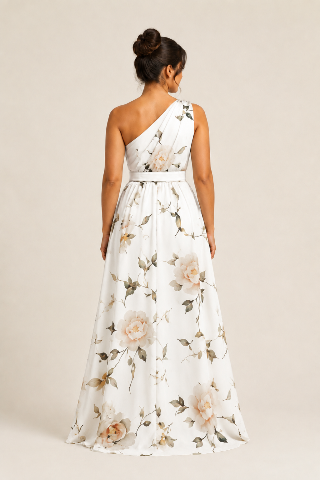 Back view of the white floral one-shoulder maxi dress showing the asymmetric neckline and full skirt