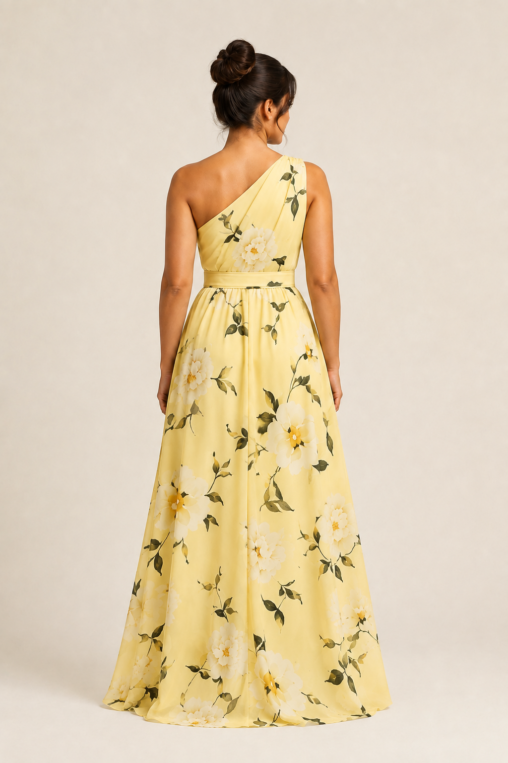 Back view of the yellow floral one-shoulder maxi dress showing the asymmetric neckline and full skirt