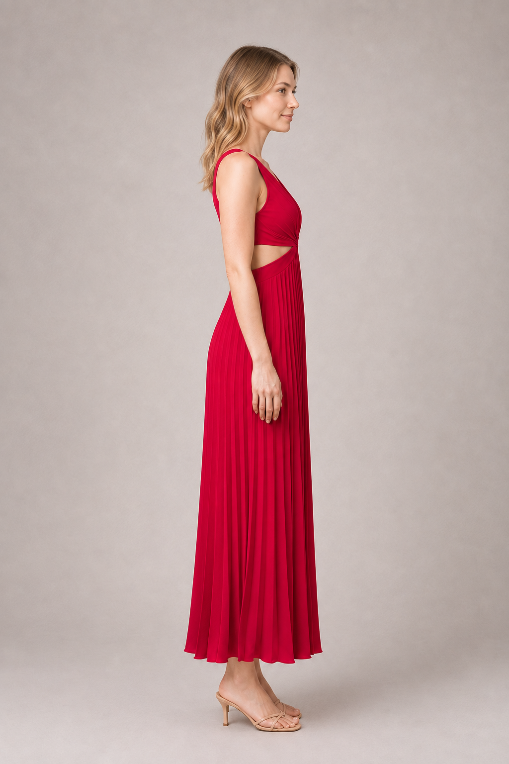 Side view of the red flowing pleated maxi dress