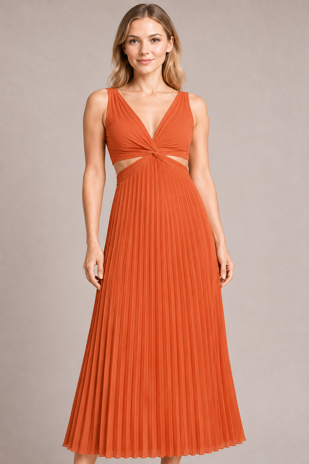 Model-worn close-up of the watermelon-red dress showing the fine vertical pleats and smooth surface