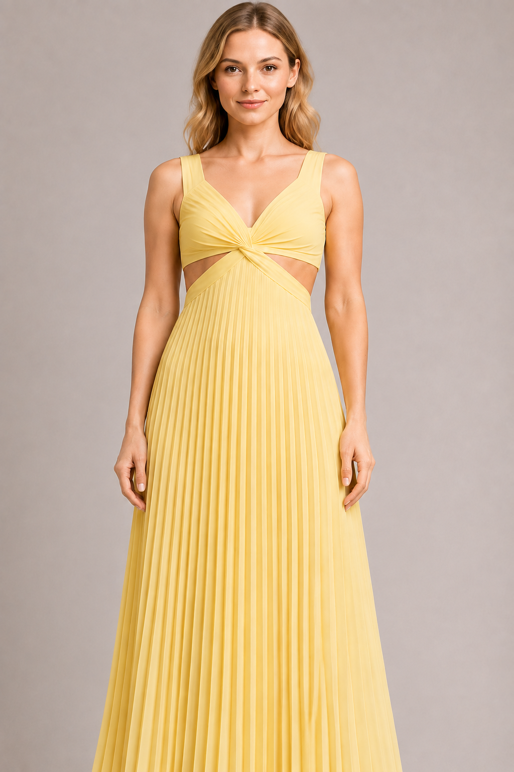Model-worn close-up of the yellow dress showing the fine vertical pleats and smooth surface