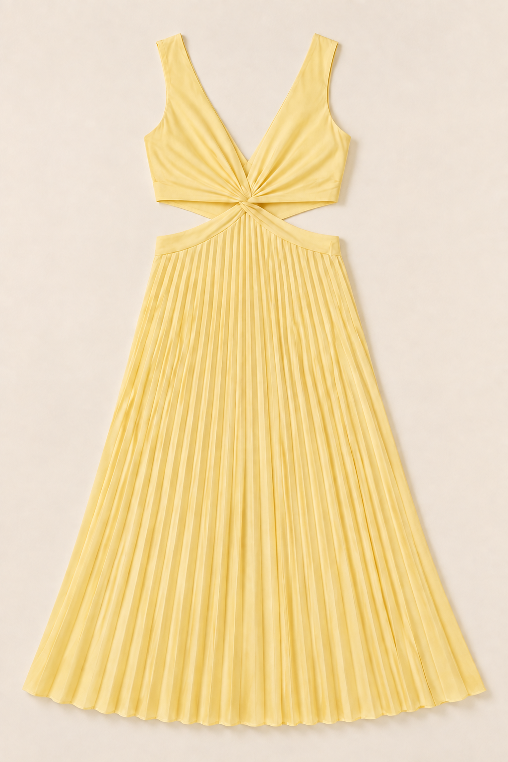 Flat-lay of the yellow flowing pleated maxi dress