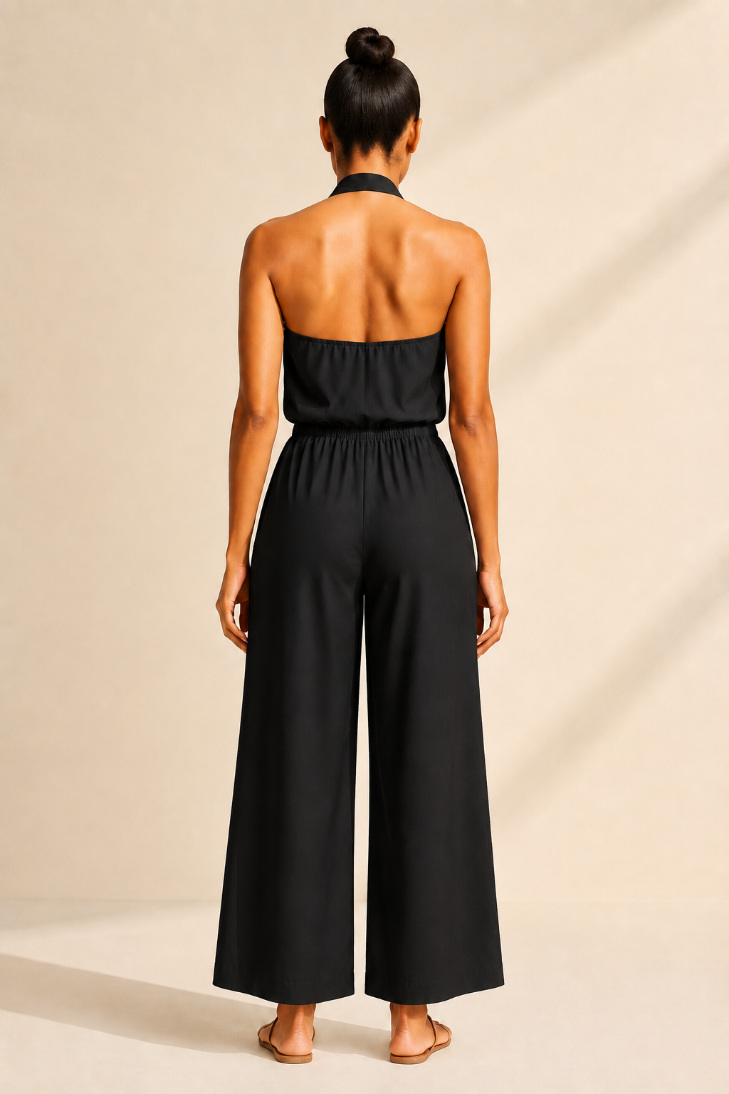 Halter-Neck Cropped Wide-Leg Jumpsuit in Black, back view