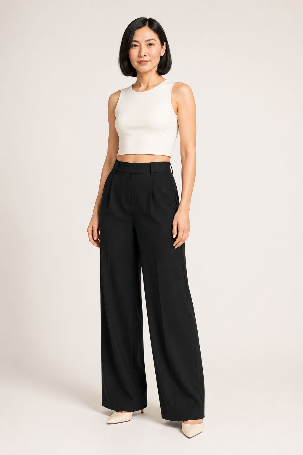 Black wide-leg trousers front three-quarter view