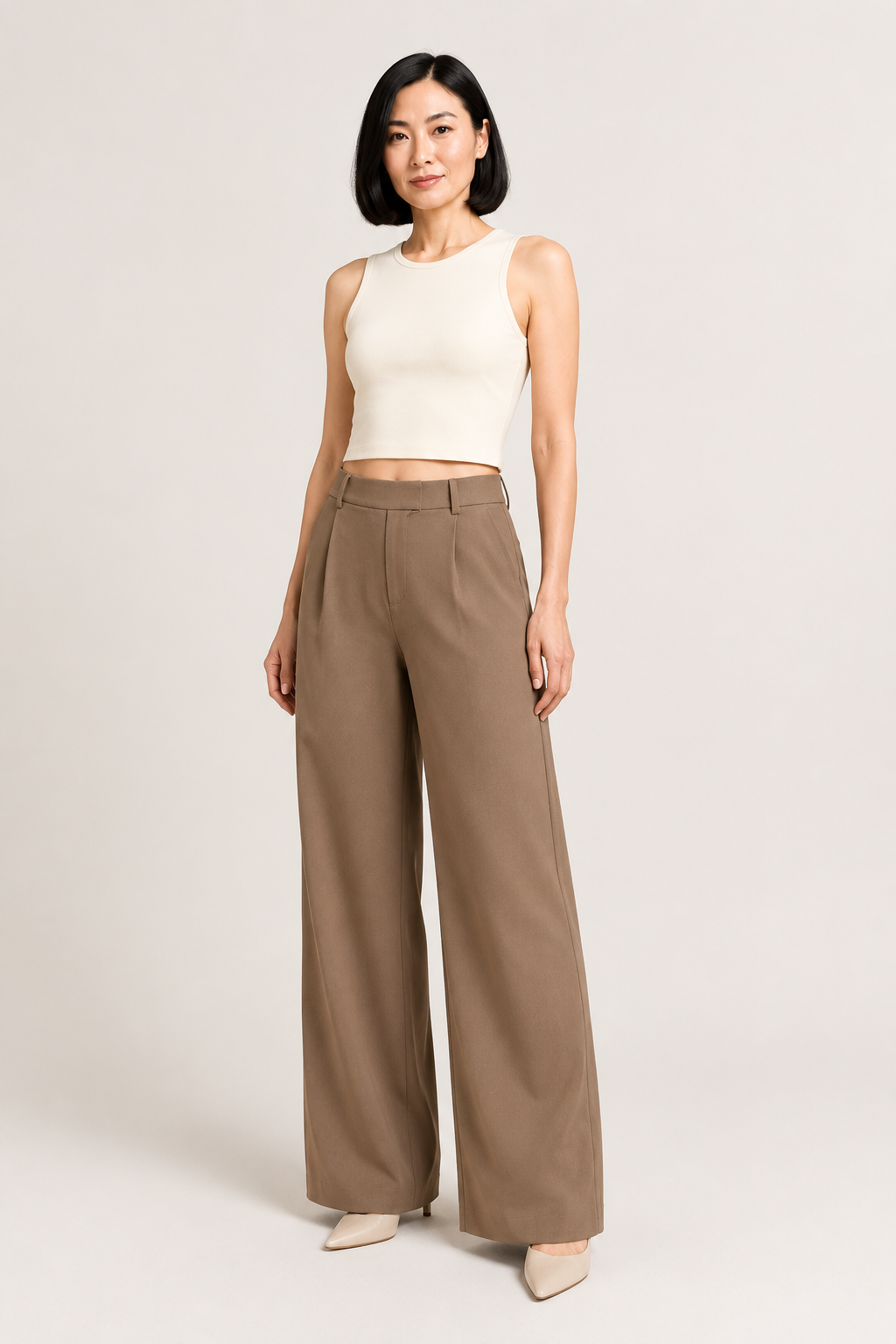 Camel wide-leg trousers front three-quarter view