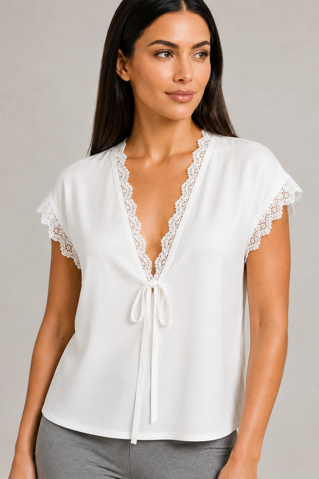White blouse tie-front construction detail