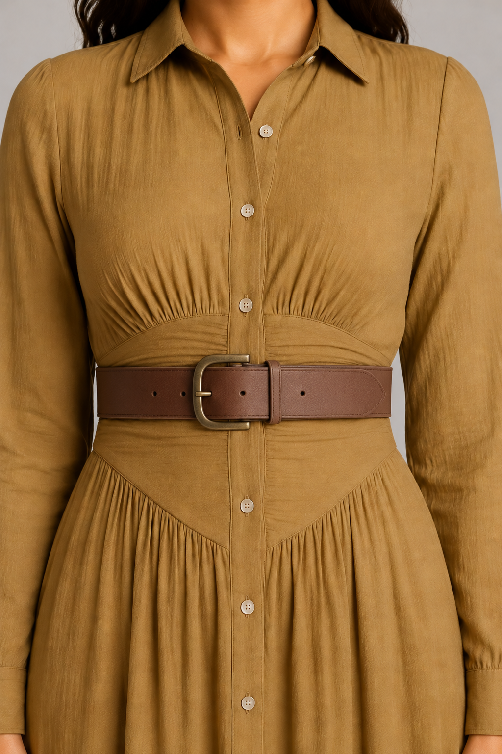 Brown pleated maxi dress with darker brown belt, ruched waist and button-placket detail