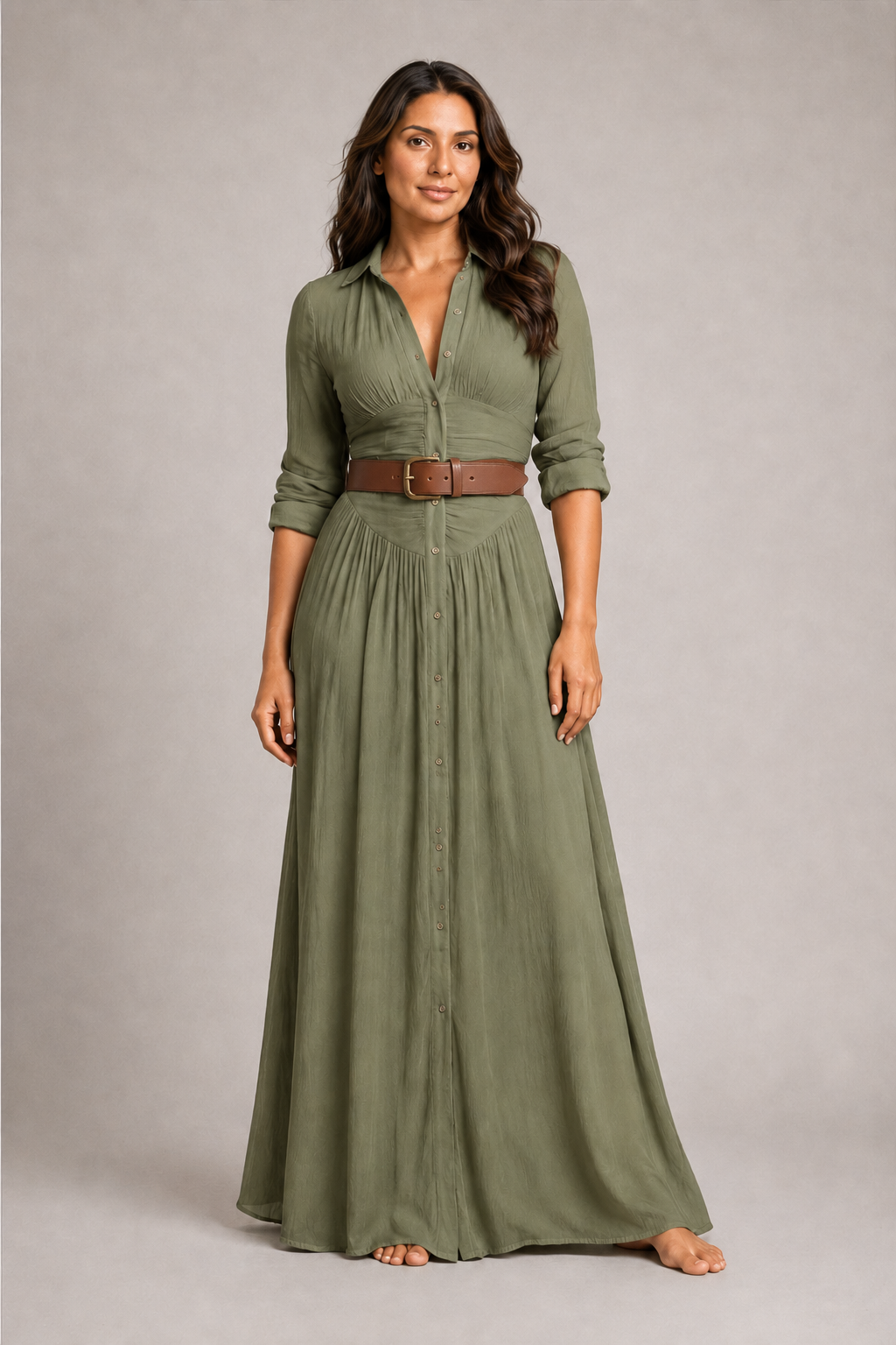 Green notched-collar pleated maxi dress with brown belt, front three-quarter view