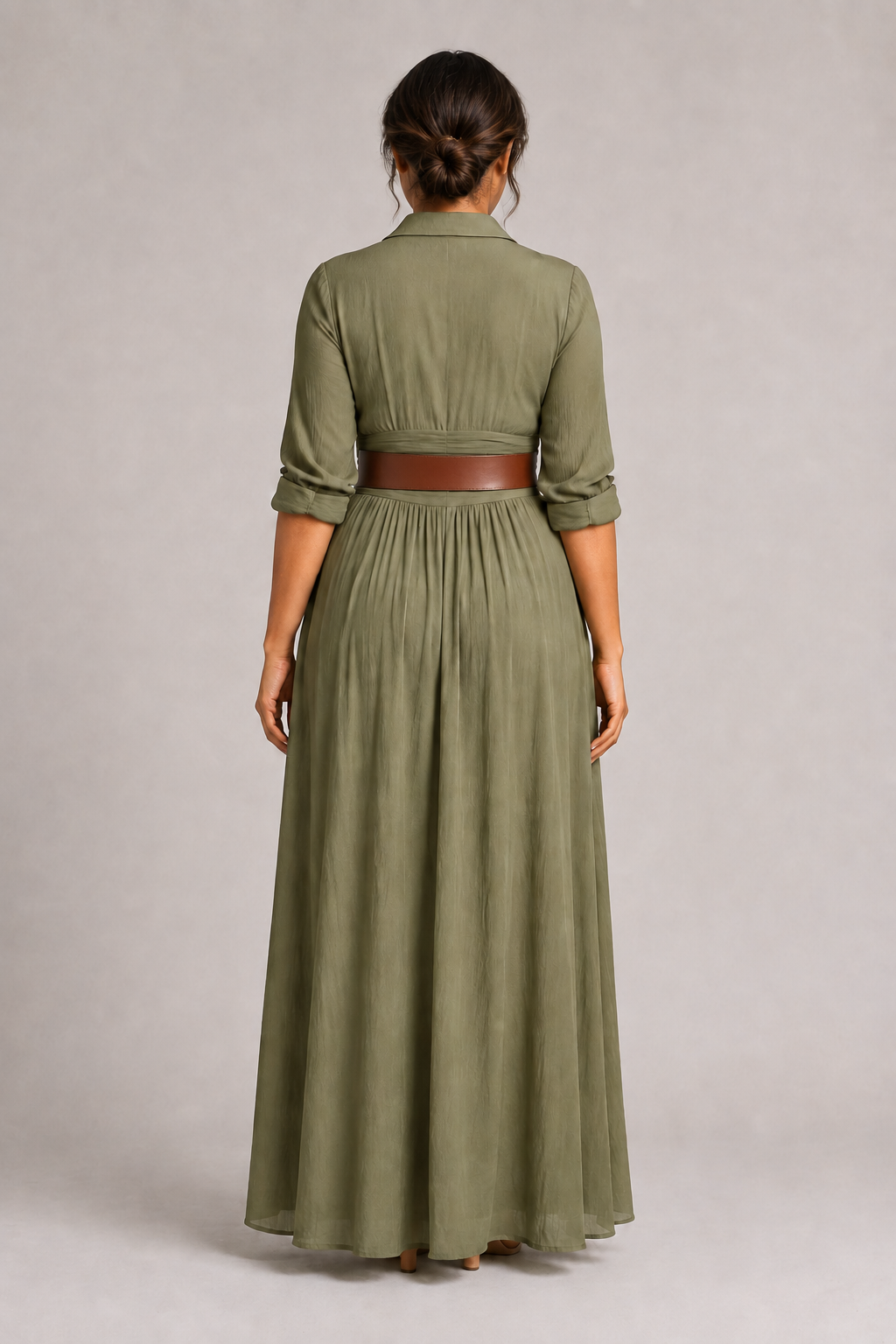 Green notched-collar pleated maxi dress with brown belt, back view