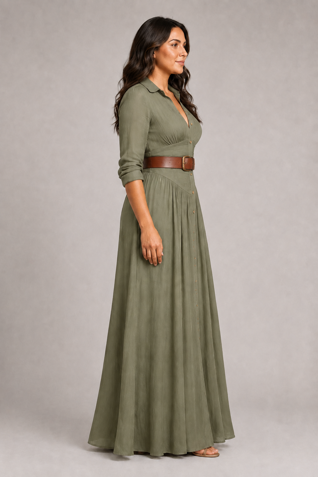 Green notched-collar pleated maxi dress with brown belt, side view