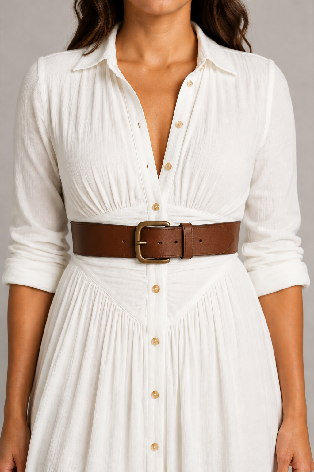 White pleated maxi dress with brown belt, ruched waist and button-placket detail