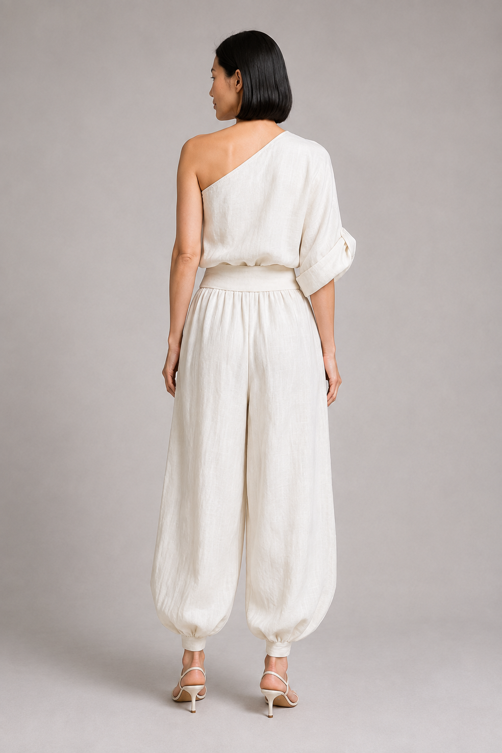 Ivory one-shoulder draped trouser set, back view