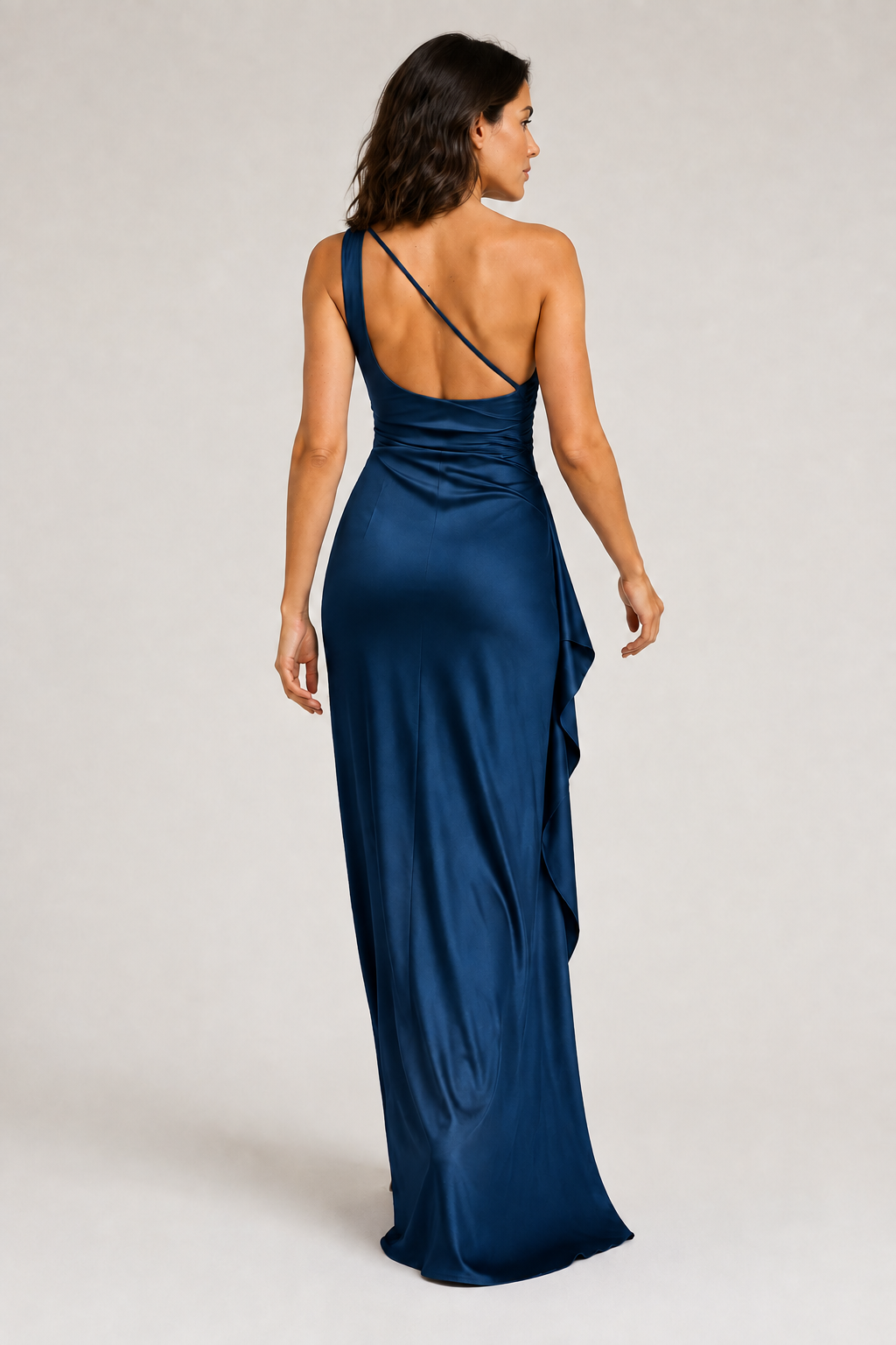 Blue one-shoulder flowing maxi dress, open-back strap construction detail