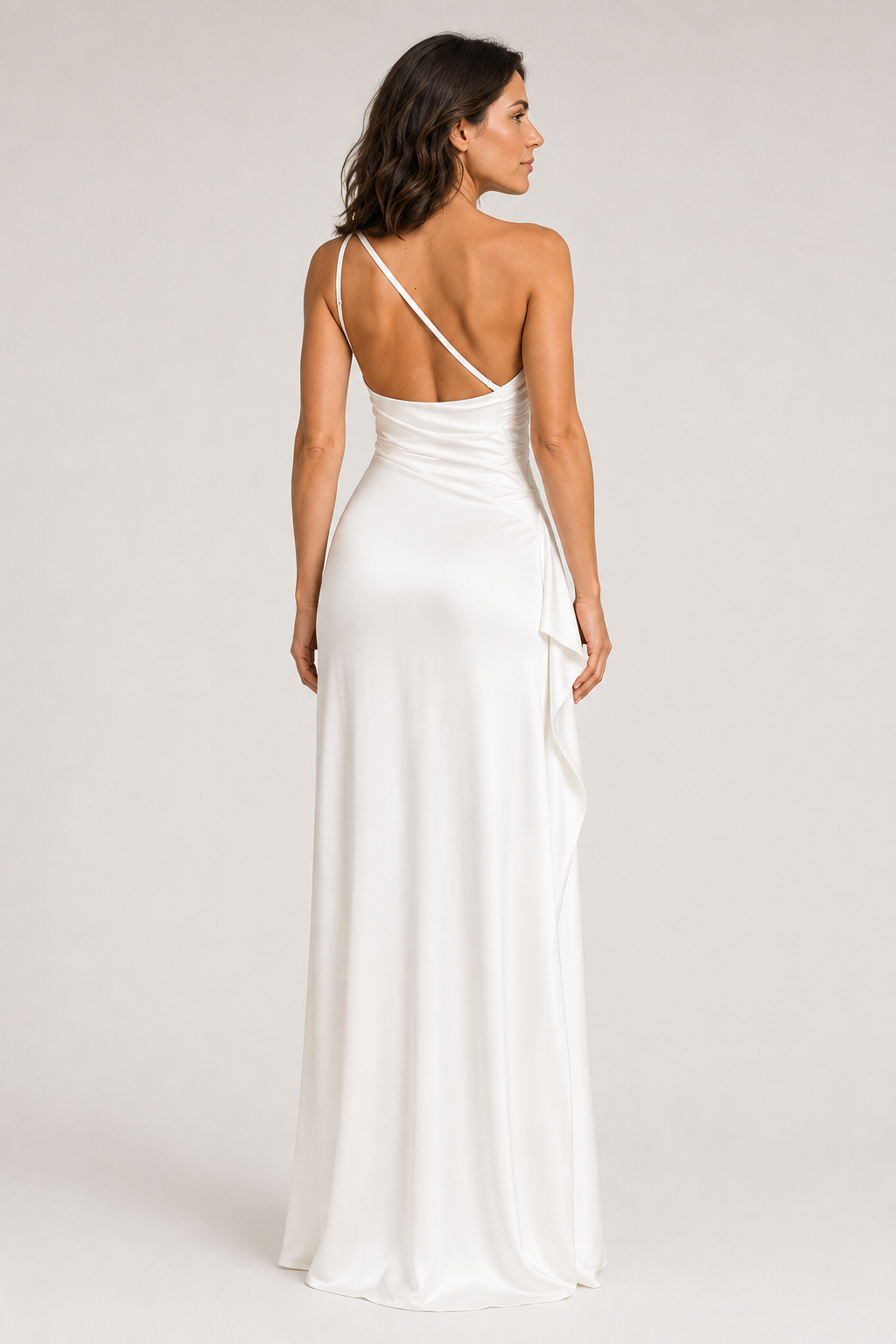 White one-shoulder flowing maxi dress, back view
