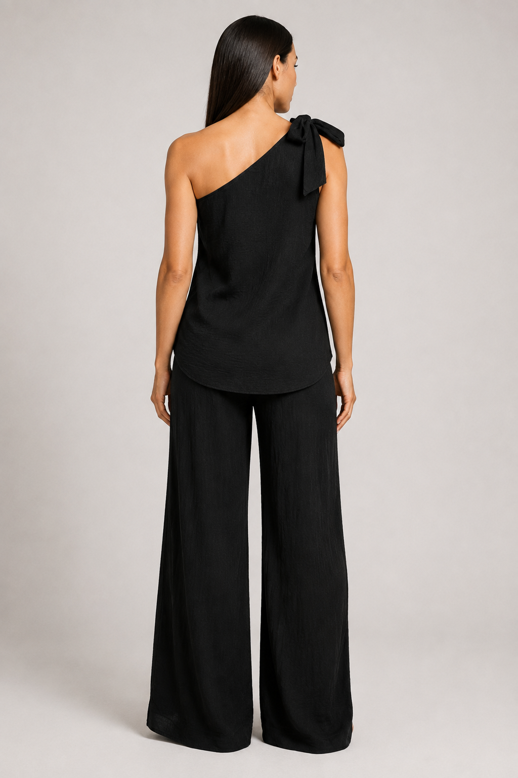Black one-shoulder wide-leg trouser set, back view