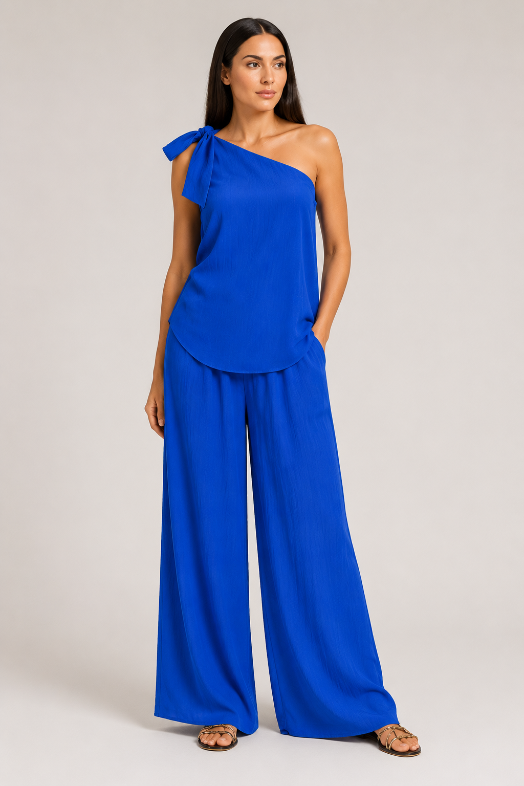 Blue one-shoulder wide-leg trouser set, front three-quarter view