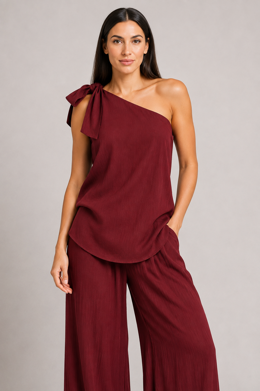 Burgundy one-shoulder wide-leg trouser set, crinkle fabric detail