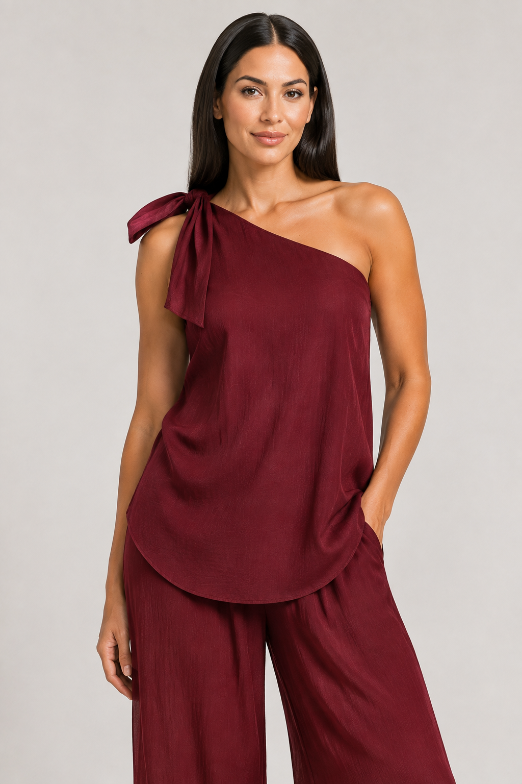 Burgundy one-shoulder wide-leg trouser set, shoulder tie construction detail