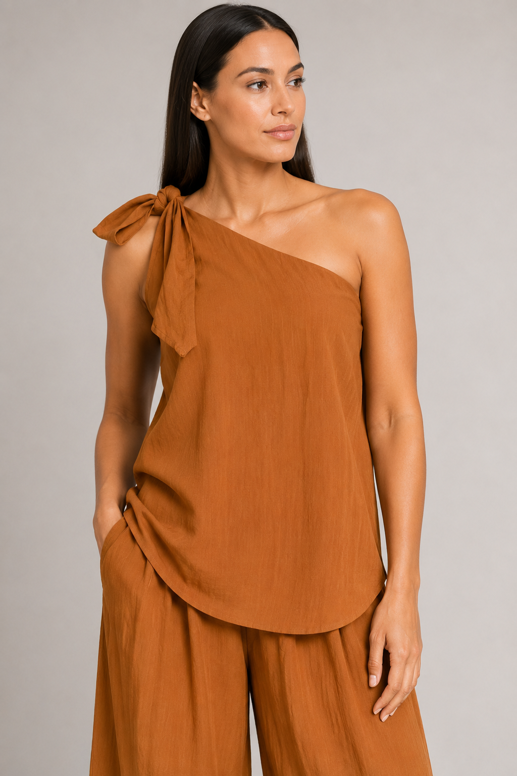 Caramel one-shoulder wide-leg trouser set, shoulder tie construction detail