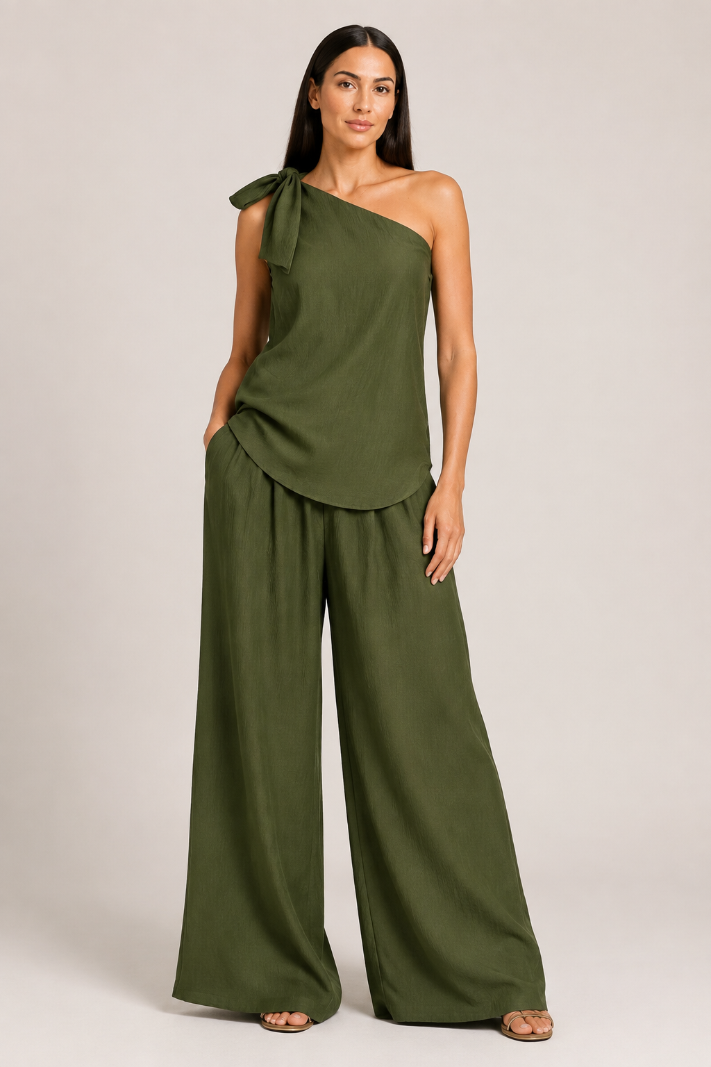 Green one-shoulder wide-leg trouser set, front three-quarter view