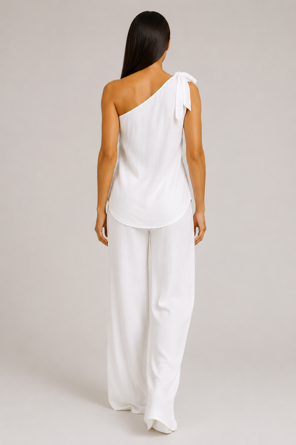 White one-shoulder wide-leg trouser set, back view