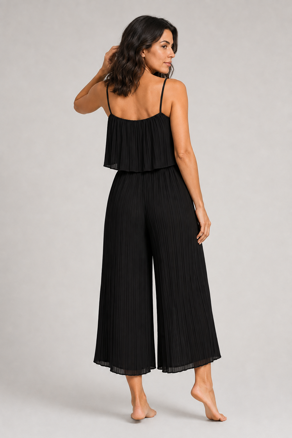 Black pleated wide-leg jumpsuit, back view
