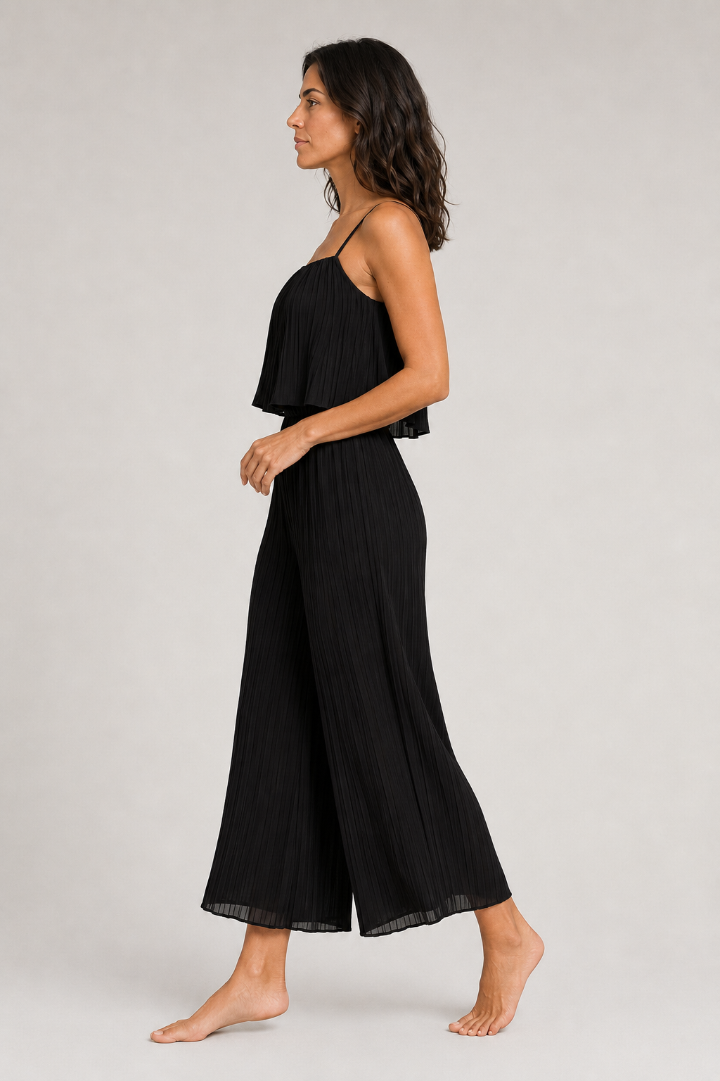 Black pleated wide-leg jumpsuit, side view