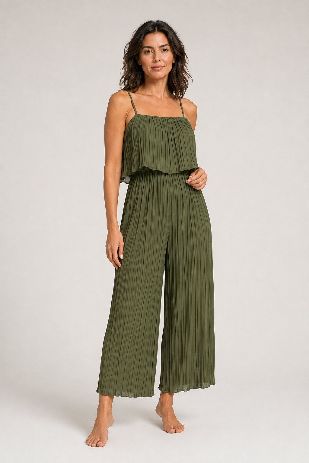 Green pleated wide-leg jumpsuit, front three-quarter view