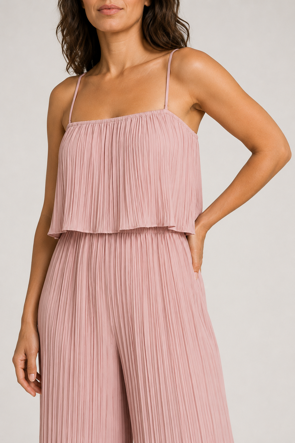 Pink pleated wide-leg jumpsuit, waistband construction detail