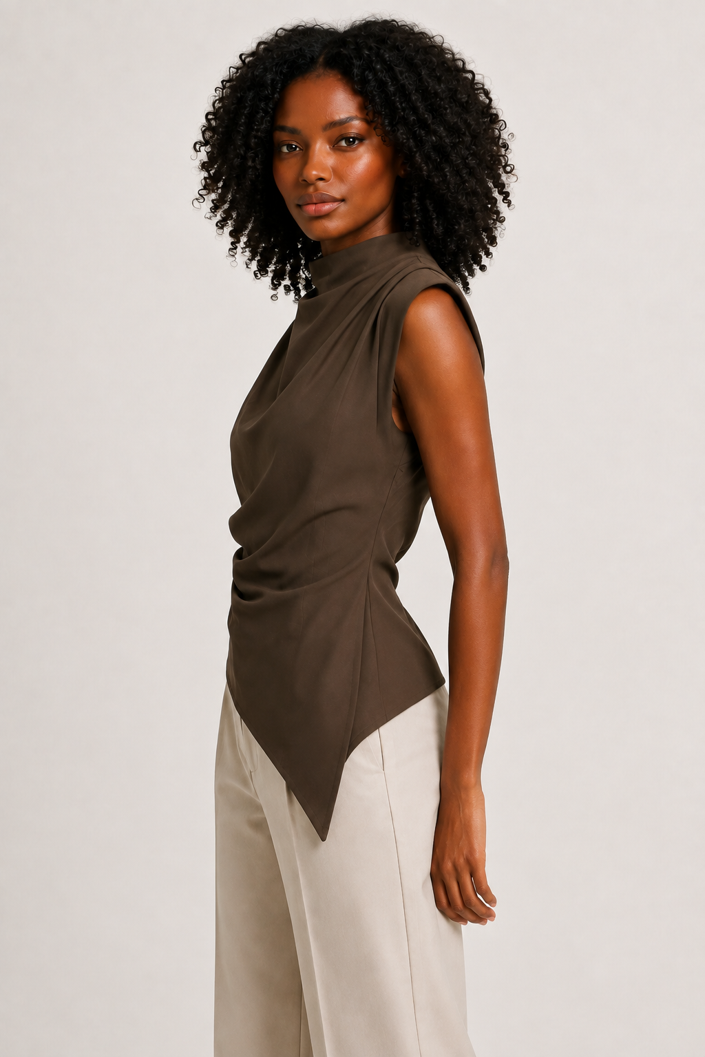 Brown sleeveless draped asymmetric top, side view