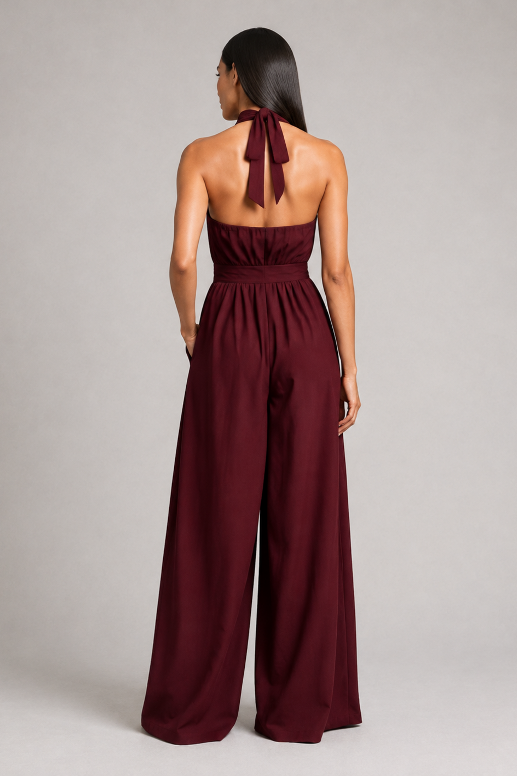 Burgundy sleeveless halter-neck wide-leg jumpsuit, back view