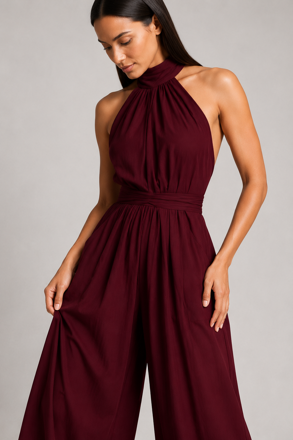 Burgundy sleeveless halter-neck wide-leg jumpsuit, fabric detail