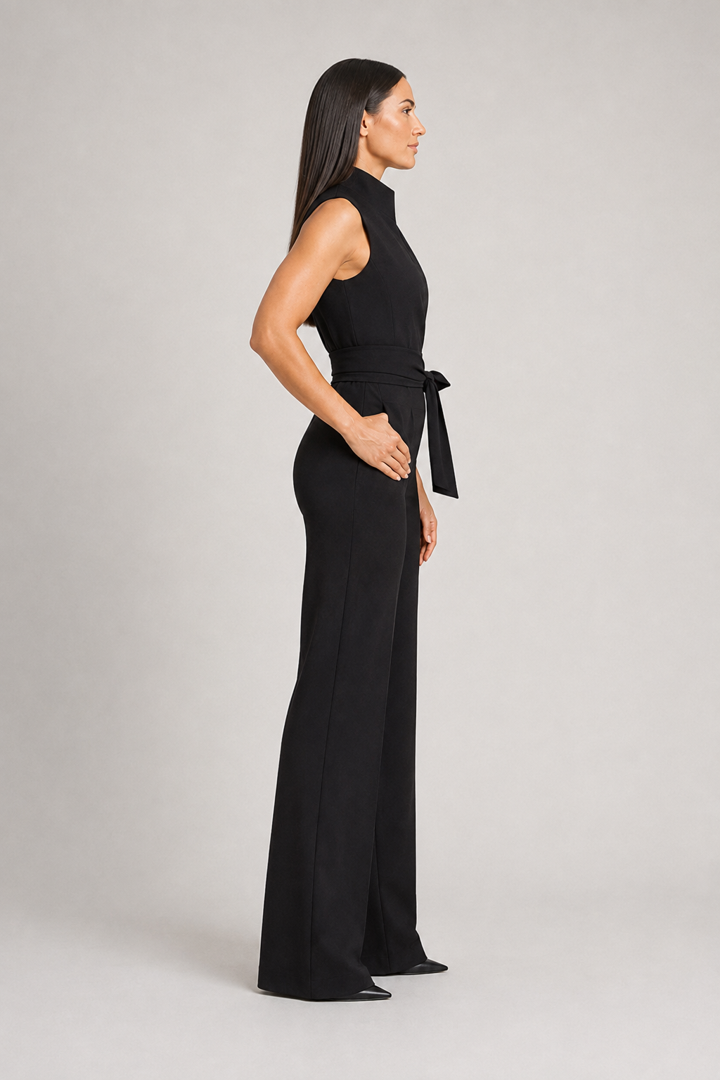 Sleeveless High-Collar Belted Jumpsuit in Black, side view