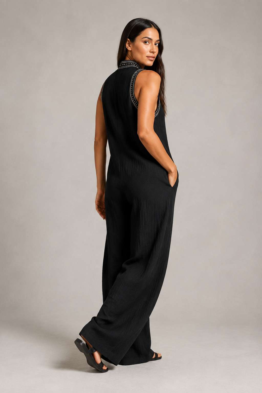Sleeveless High-Neck Zip Jumpsuit in Black, back view