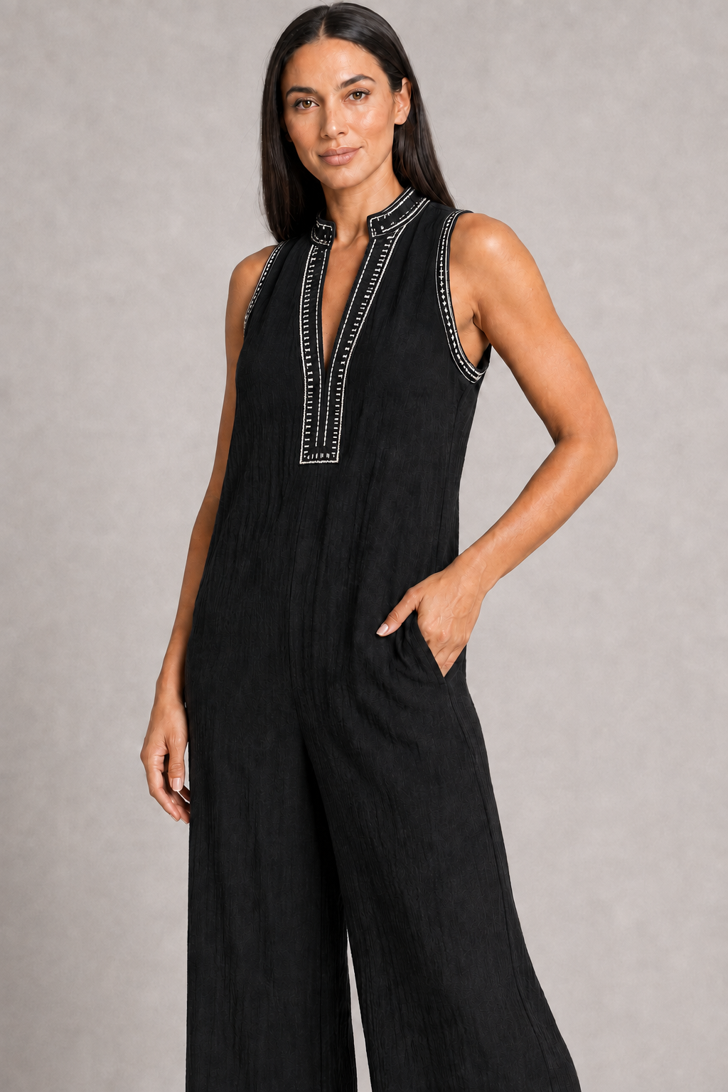 Sleeveless High-Neck Zip Jumpsuit in Black, waistband construction detail