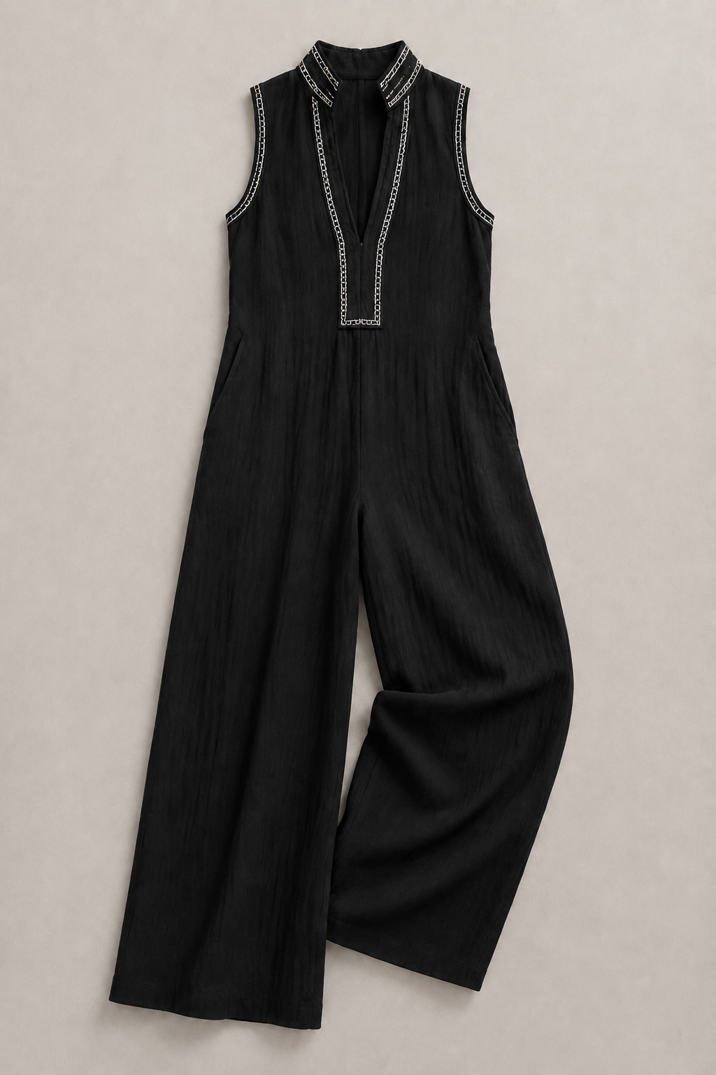 Sleeveless High-Neck Zip Jumpsuit in Black, flat lay