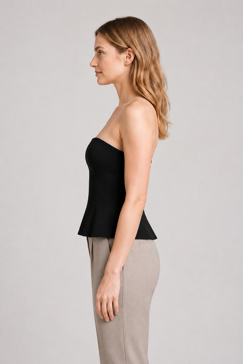 Strapless Corset Top with Flared Hem in Black, side view